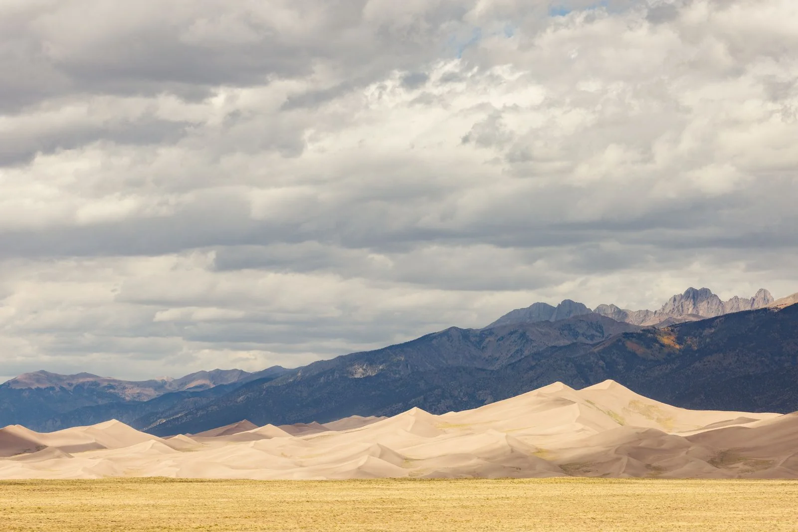 Great sand dunes with San Luis mountain range in background